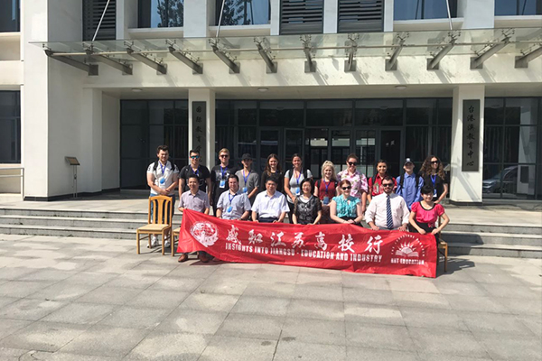 Students posted for a picture with leaders of Nanjing University of Chinese Medicine